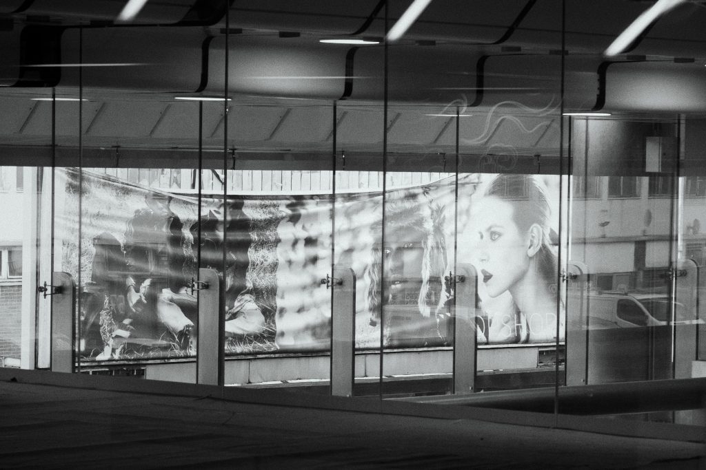 Faces in a shopping mall. Using your vision to take photographs like this